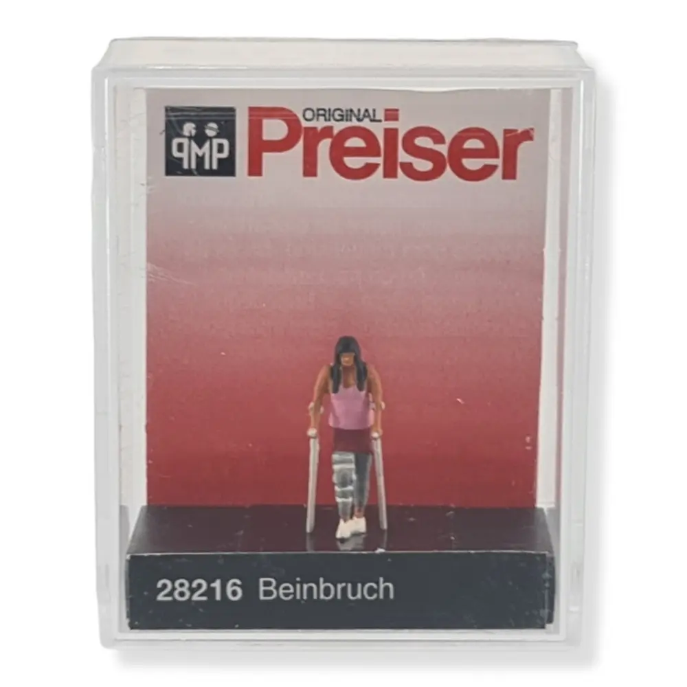 Femme en béquilles avec attèle genou PREISER 28216 - HO 1/87 - 2